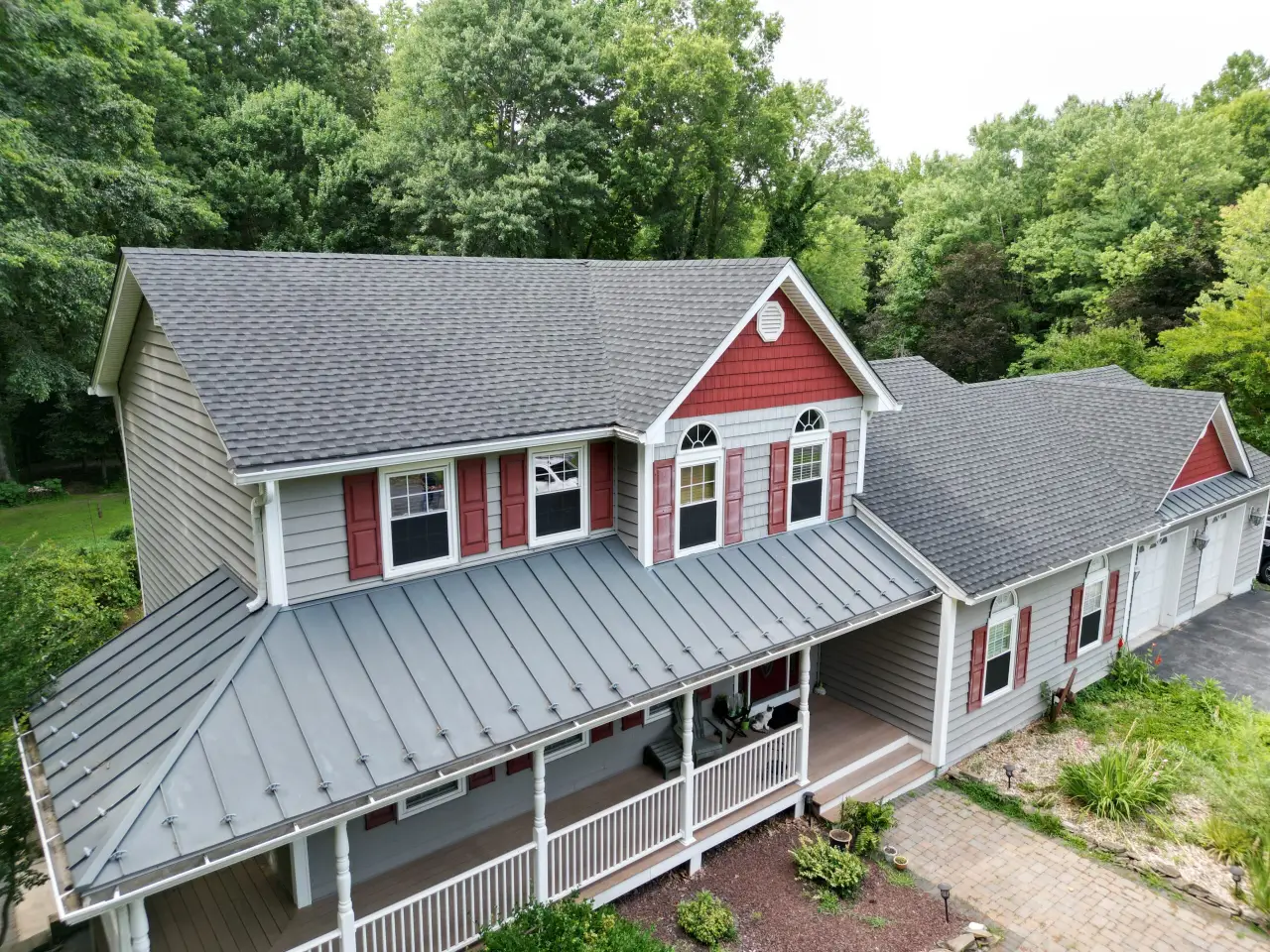 A house with a roof in good condition after Elite Project Services did a roof replacement